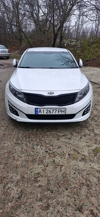 Киа оптима 2.4 гибрид  ех 2014г