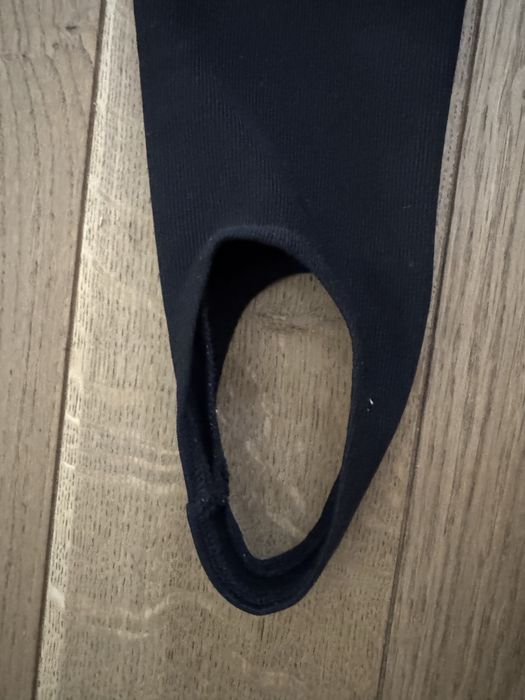 Czarne legginsy 4F