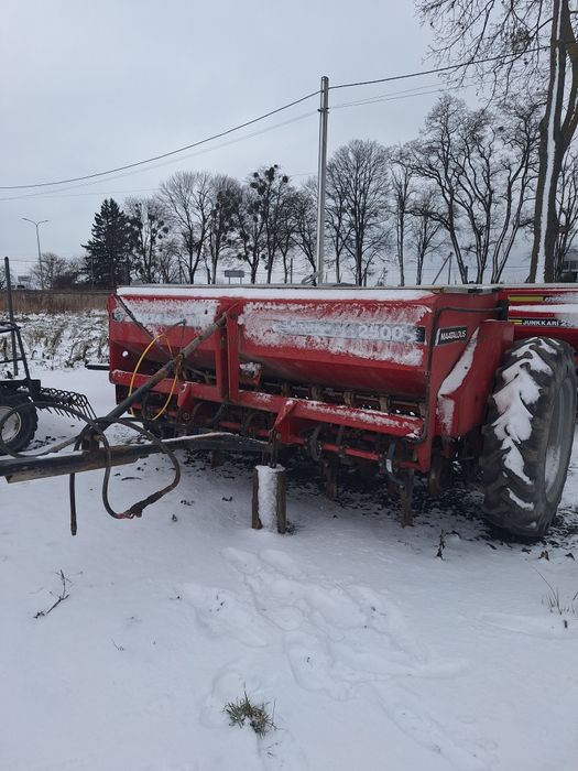 Дискова сівалка SIMULTA 2500 приципна з катками на два бачки