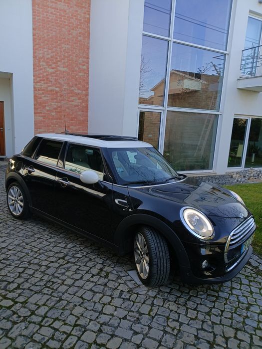 Mini Cooper D com todos os extras, sempre assistindo na marca.