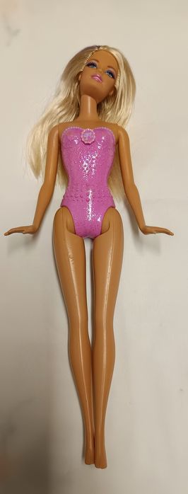 Barbies novas e antigas