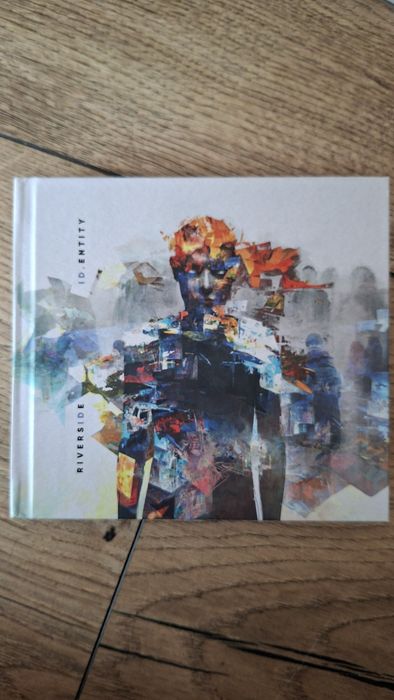 Płyty CD Riverside z autografami