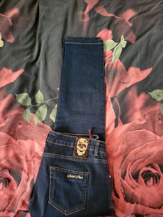 Продам жіночі джинси 34 розмір