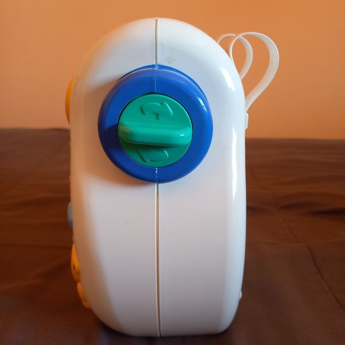 Brinquedo musical com projetor de imagem para bebé