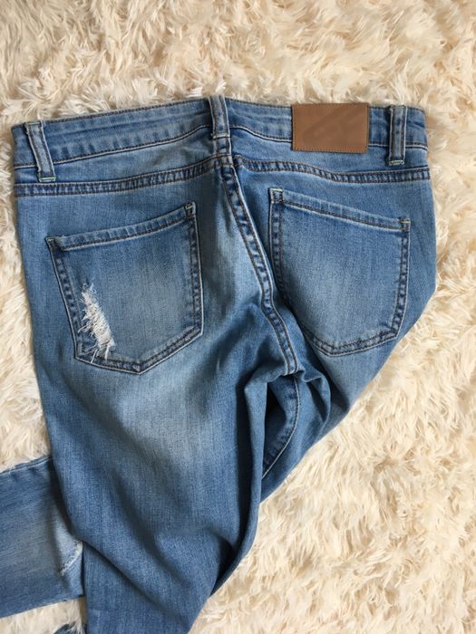 Jeansy z dziurami xs s