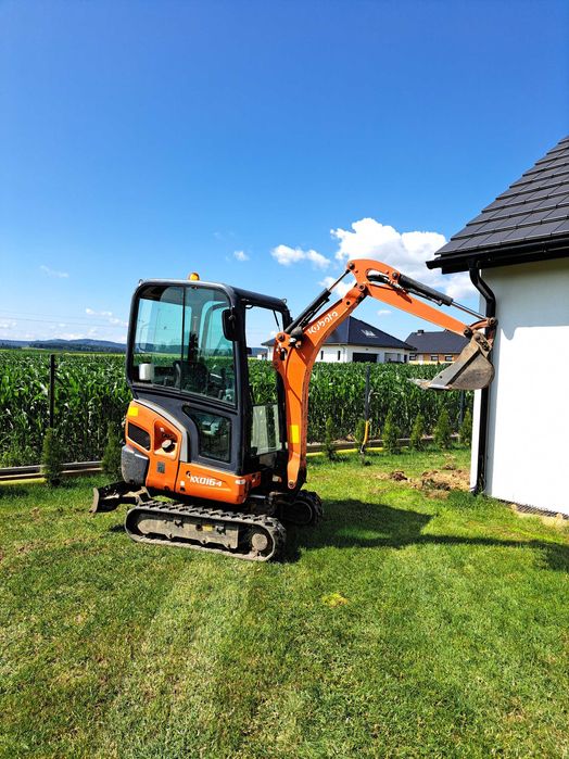 Wynajem koparki z operatorem , prace ziemne , usługi koparką , koparka