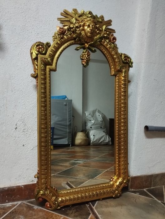 Espelho decorativo "deus Sol" dourado