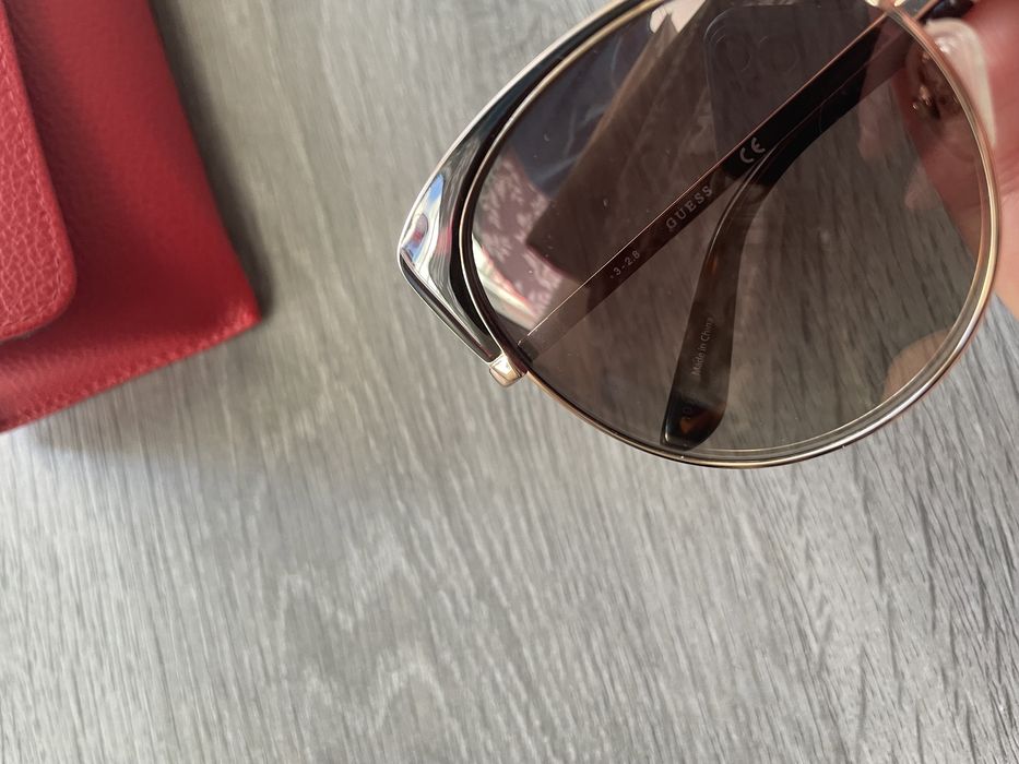 Guess óculos de sol, olho de gato dourados