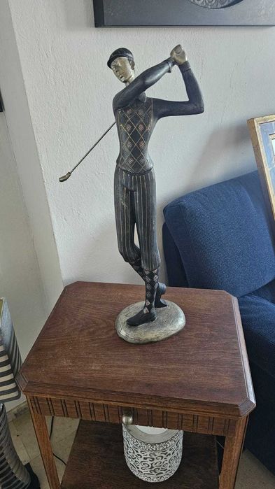 Estatueta de golfista