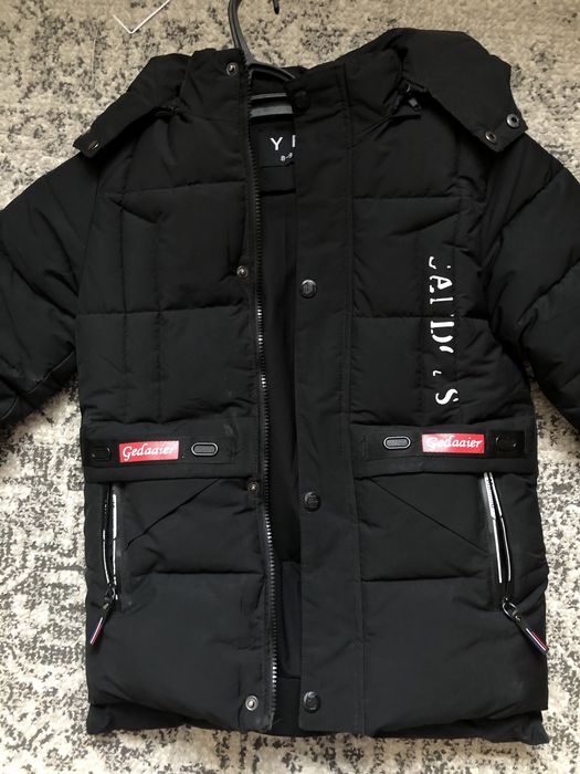 Зимова куртка на хлопчика 8-9 років