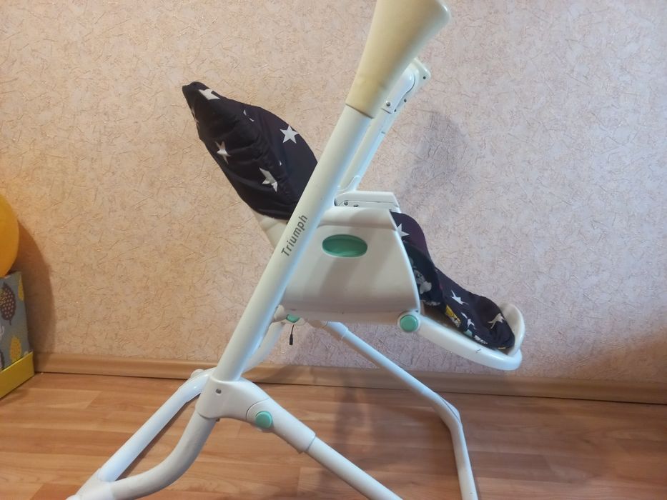 Стульчик-качеля для кормления