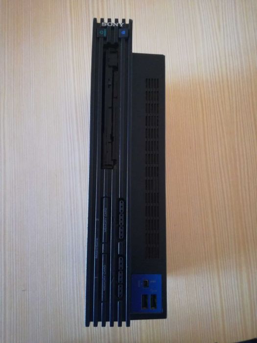 Playstation 2 com 2 comandos