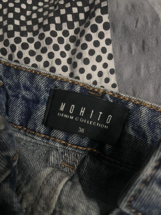 Niebieskie spodnie jeansowe MOHITO