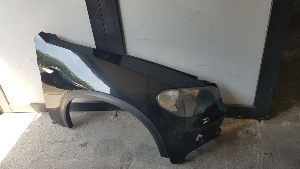 Guarda lamas e farol  bmw x5 E70