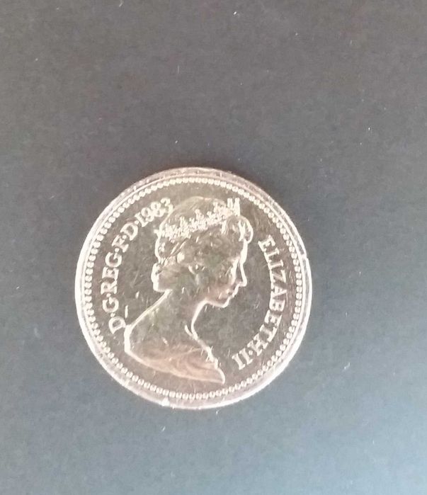 1 libra, Isabel II de 1983, flor de cunho.