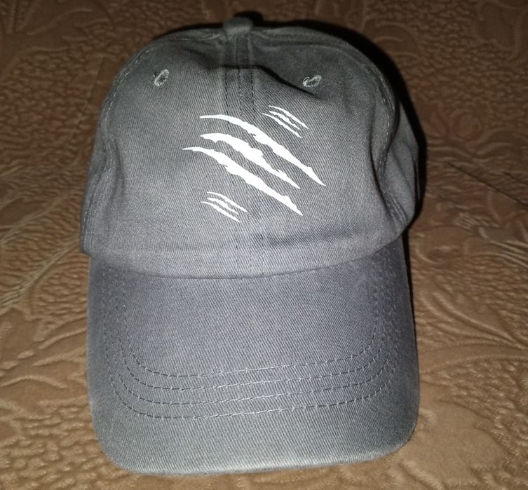 Бейсболка нова,сірого кольору