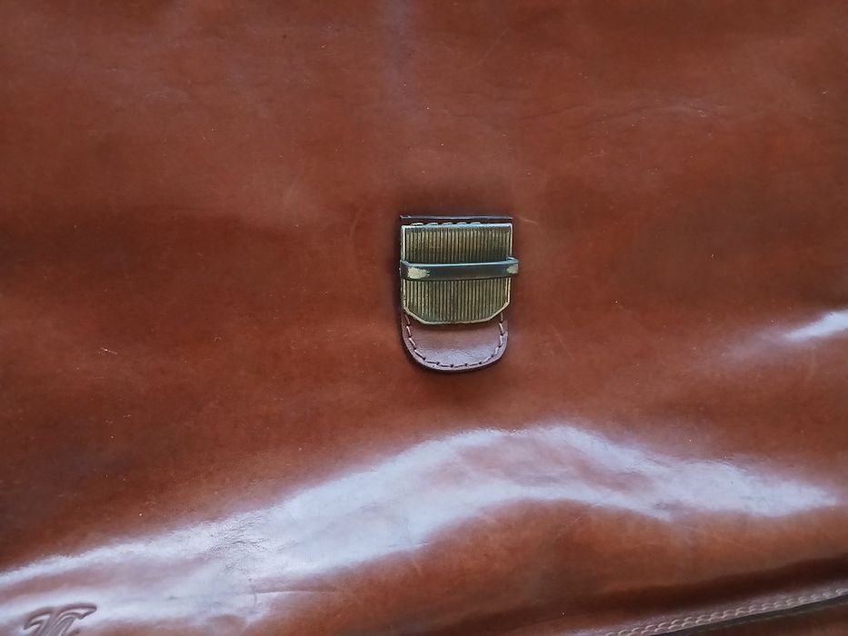 Pasta de executivo/professor, em couro.