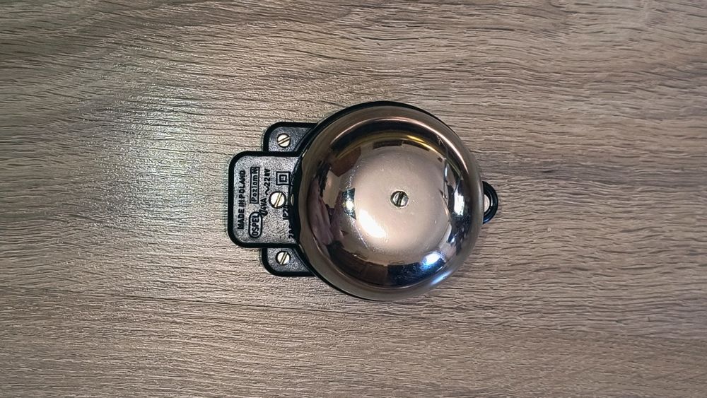 Zabytkowy dzwonek bezzakłóceniowy 220V PRL Ospel