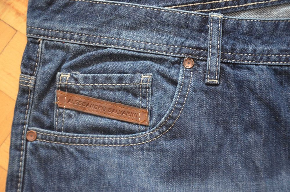 Spodnie dżinsy jeansy Alessandro Salvarini W42 L30 nowe z met. granat