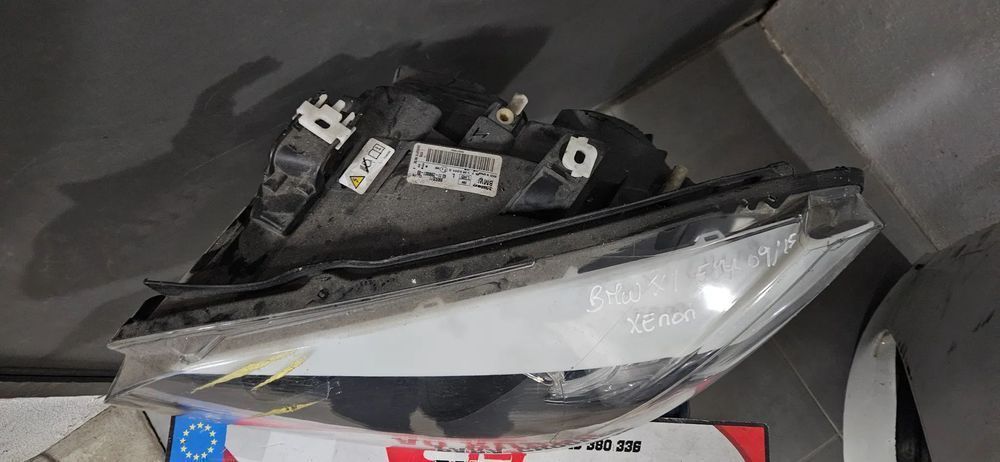 Farol esq bmw x1 xenon E84 2009