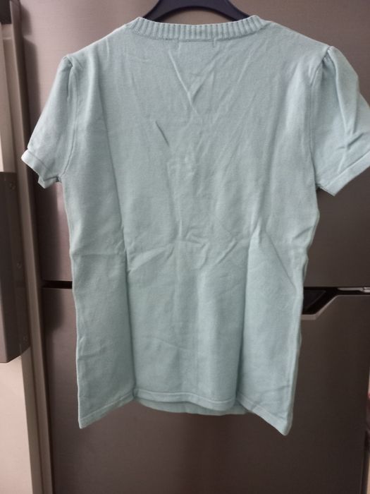 Blusa trespassada cor turquesa claro