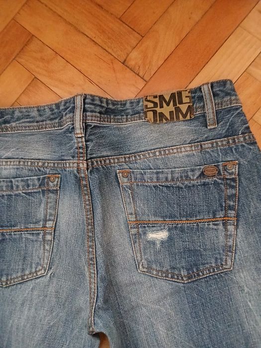 Spodnie jeans męskie z przetarciami  New Yorker  34