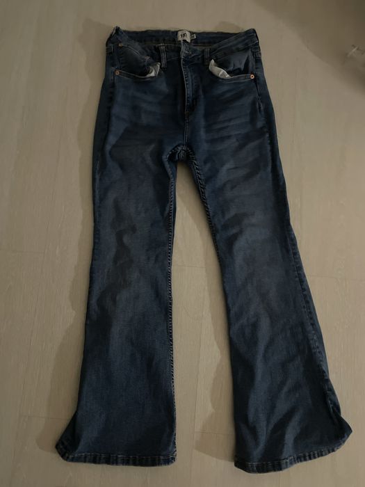 женские flared джинсы