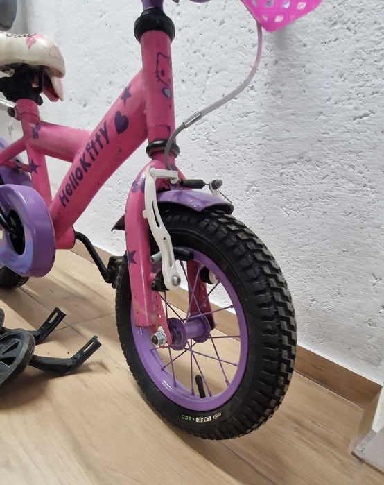 Rowerek dziecięcy 12"kółka boczne kask koszyczek