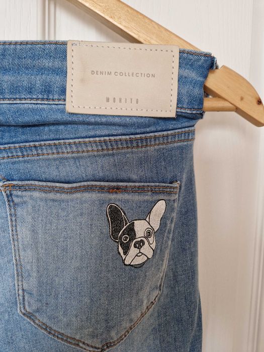 używane spodnie jeansy, dopasowuje się do sylwetki,