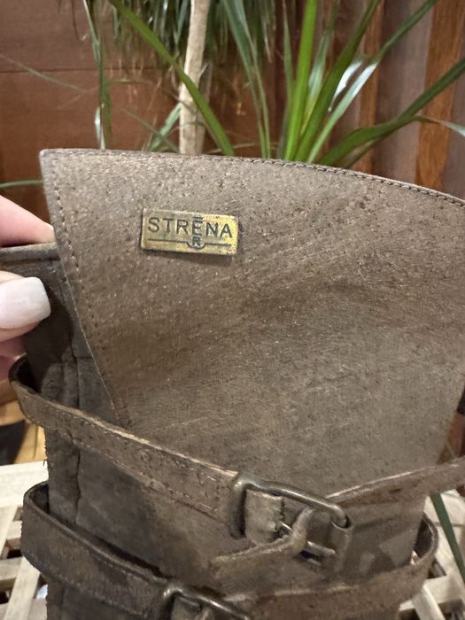 Botas cano alto castanhas