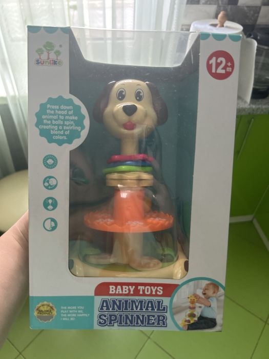 Іграшка дзиґа