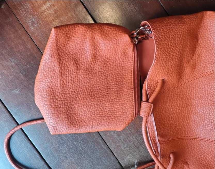 Mala alaranjada mulher