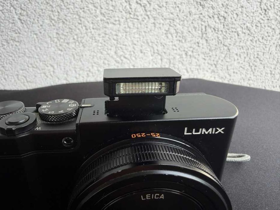 Aparat Kompaktowy Panasonic DMC-TZ100 Lumix + oryginalna ładowarka + etui + karta sd 64gb