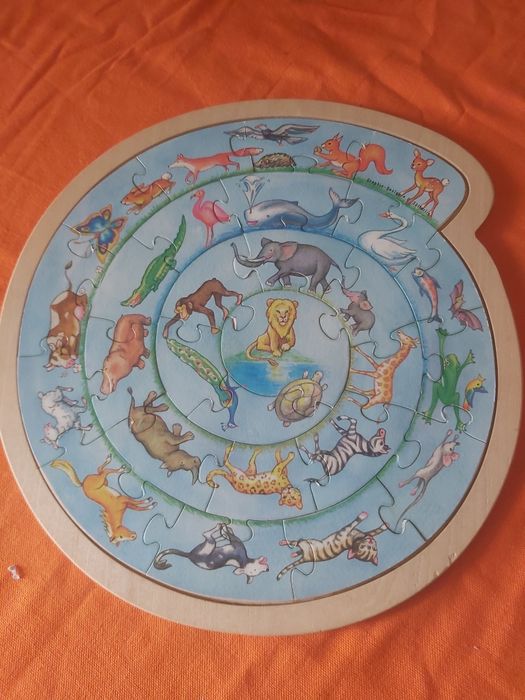 Puzzle espiral animais mapa mundo