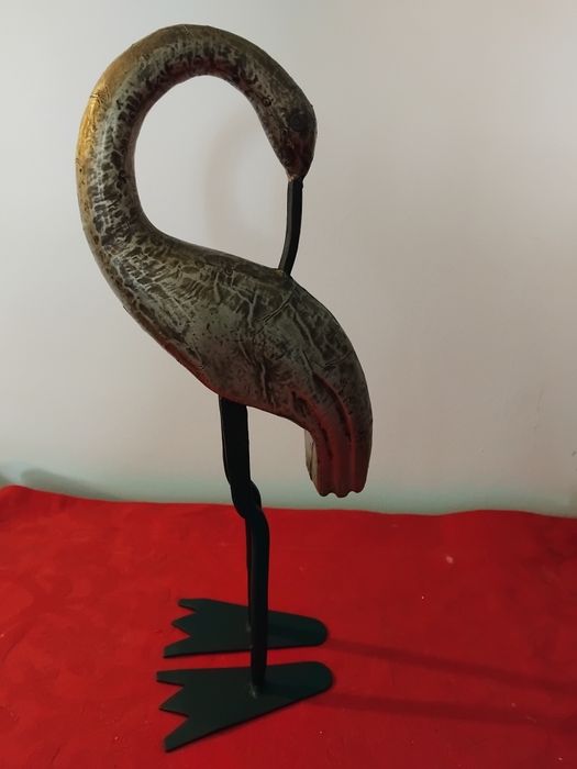 Escultura em madeira e ferro fundido