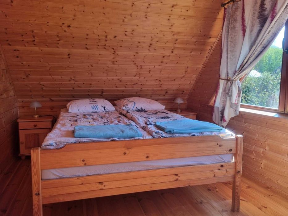 Drewniany domek nad jeziorem Mazury