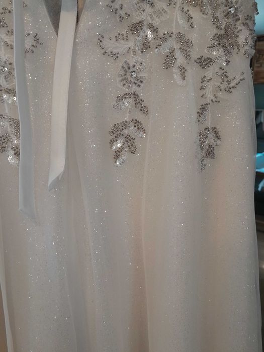 Bogato zdobiona suknia ślubna