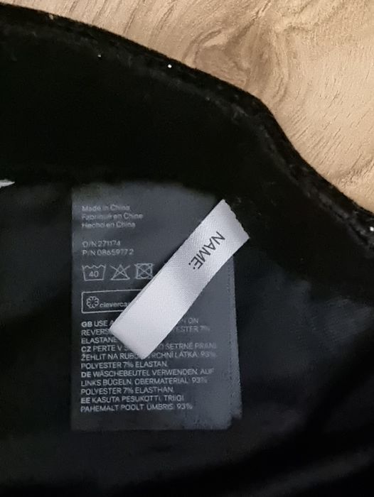 Legginsy H&M rozm. 146 czarne połyskujące z gwizdkami