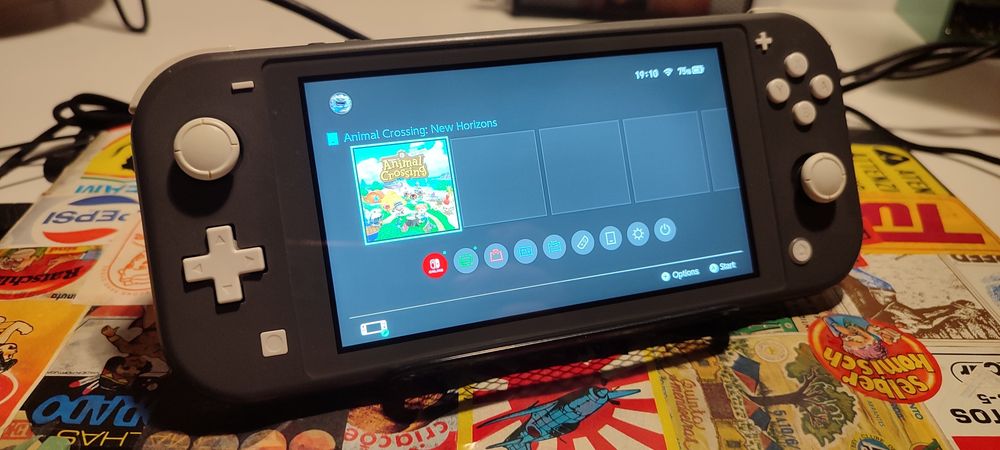 Nintendo Switch Lite + Jogo ACNH