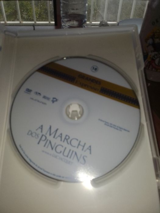 Dvd filme a marcha dos pinguins em bom estado para desocupar