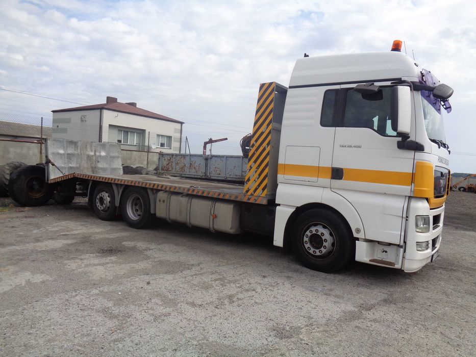 Transport maszyn pojazdów usługi transportowe Autolaweta Pomoc drogowa