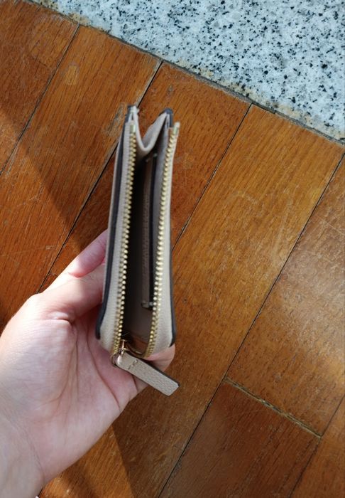 Carteiras como novas