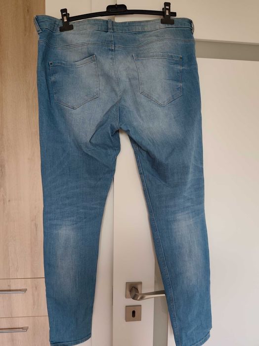 spodnie jeansy z rozdarciami damskie 44