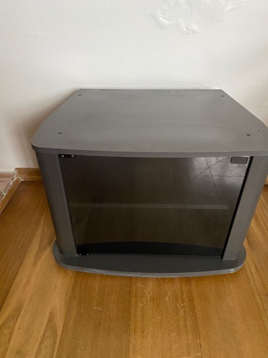 Móvel TV preto com porta de vidro