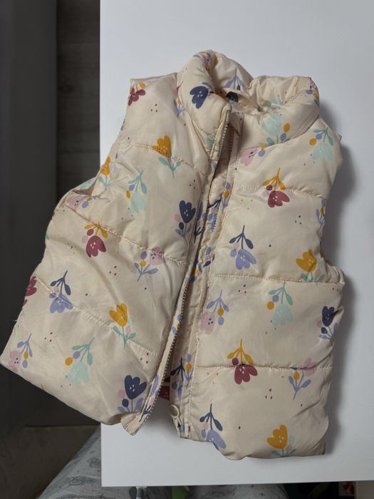 Безрукавка 9-12м.