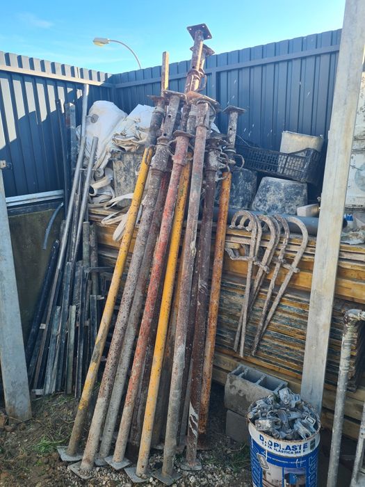 Prumo metálicos extensíveis