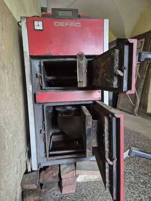 Kocioł na ekogroszek  Defro Sigma E 12 kW z zasobnikiem