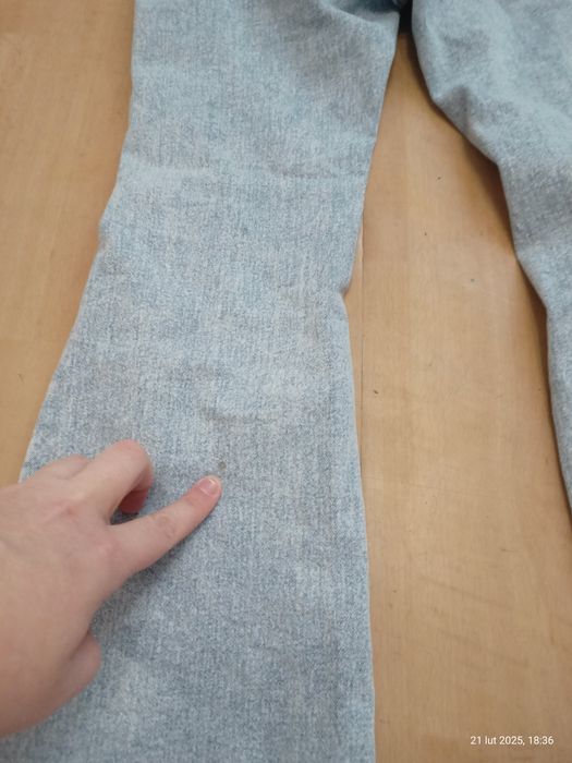 Spodnie dzwony z dziurami rozciągliwe dla dziewczynki rozm. 150