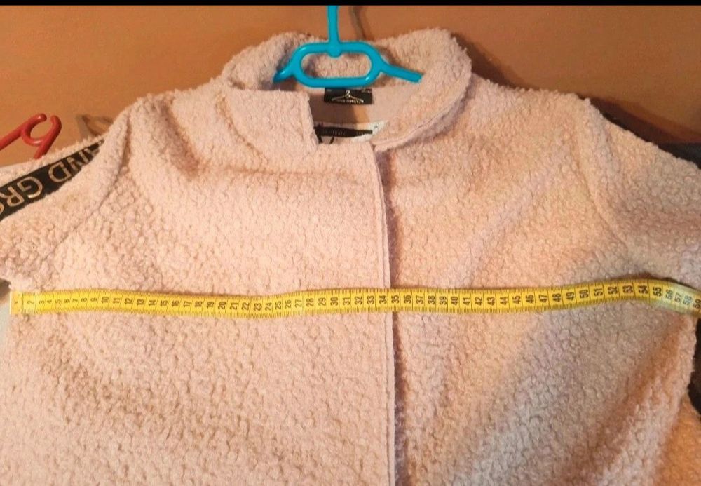 Płaszcz rozmiar 42/44 marki Butik