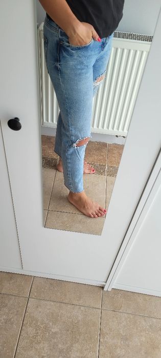 Spodnie jeansowe z przedarciami